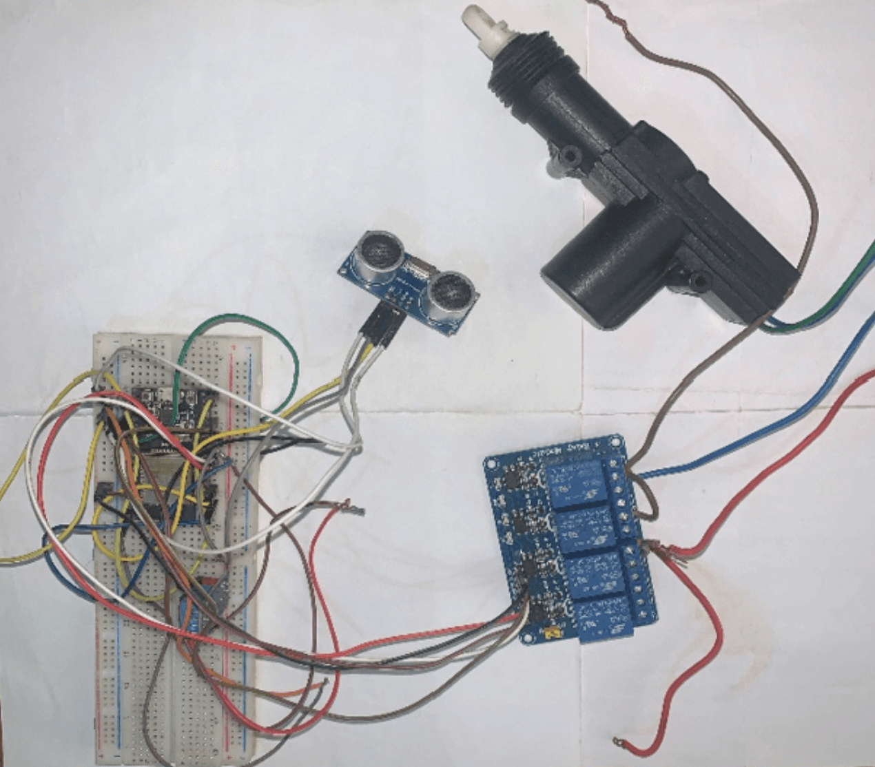 Breadboard prototype with relay module and sensors